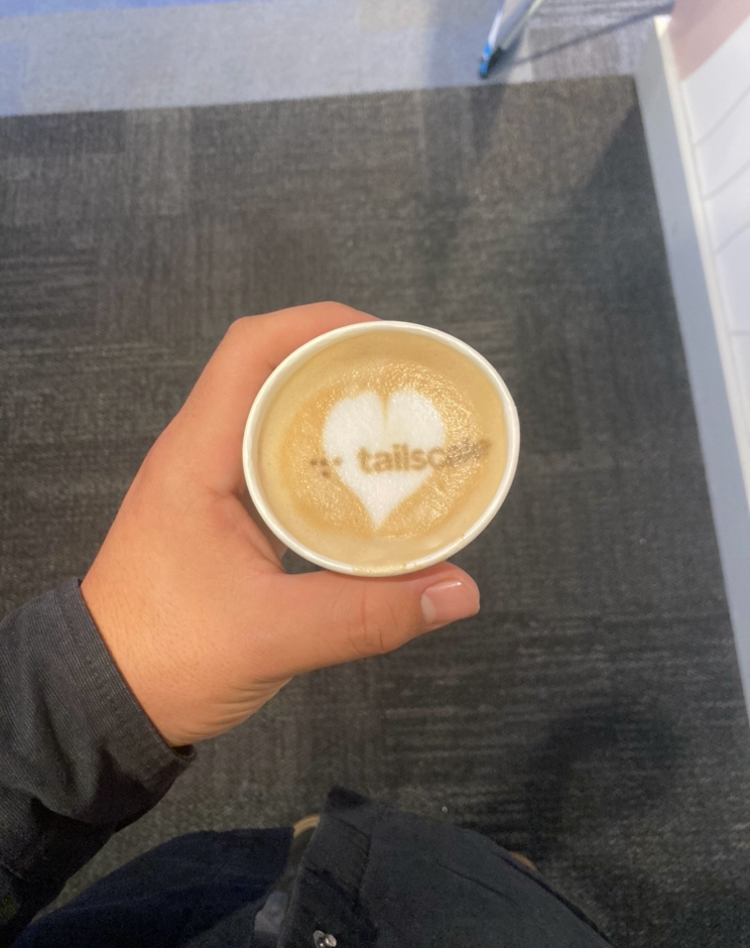 Tailscale's logo in my coffee foam.
